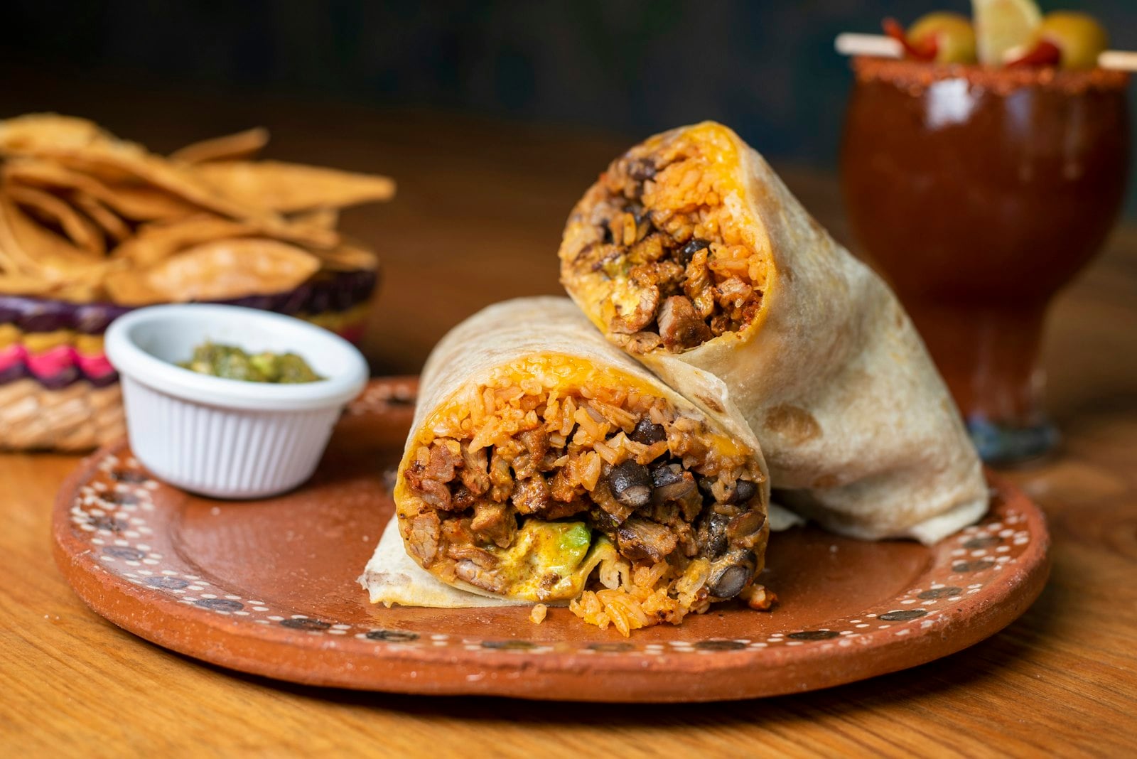 A burrito cut in half to show its filling