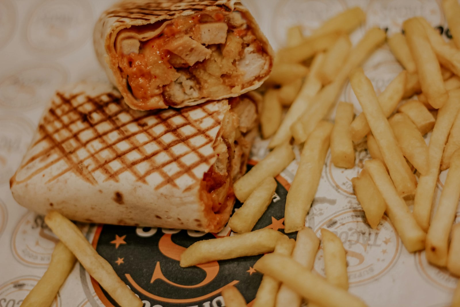 A California burrito, foil peeled back