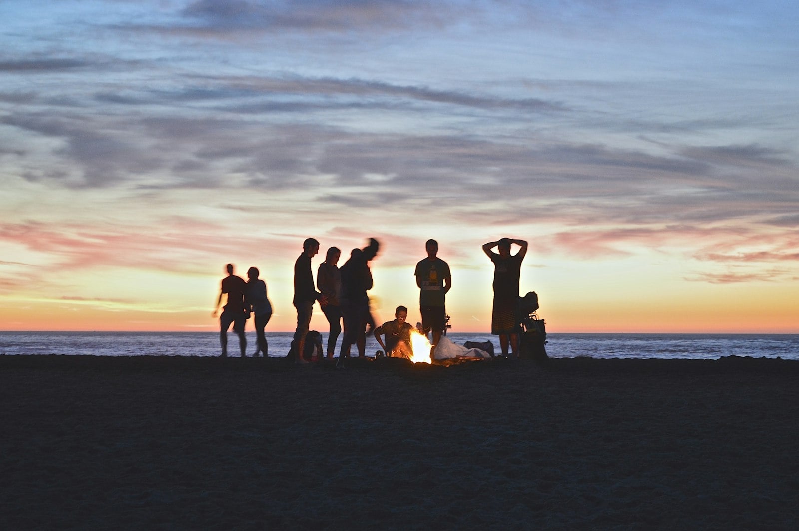 A beach fire as the sun drops