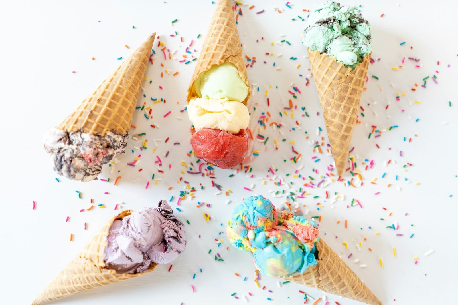 Waffle cones stacked behind a San Diego scoop-shop counter