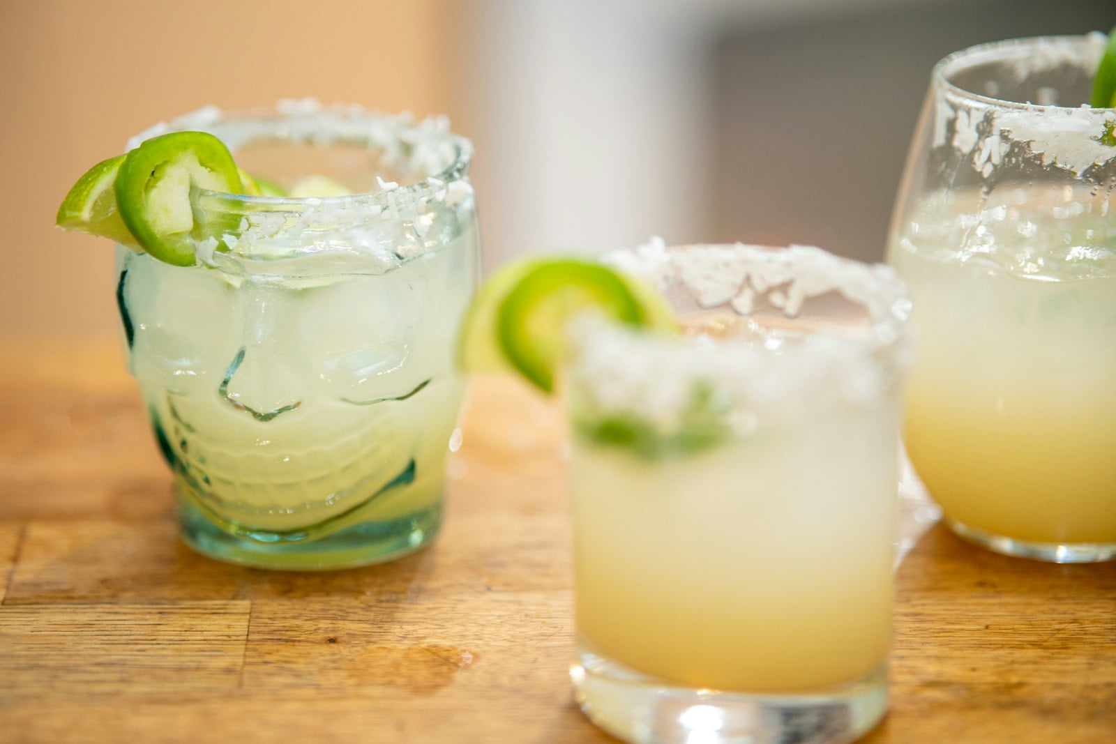 A fresh-lime margarita with a salted rim on a San Diego bar top