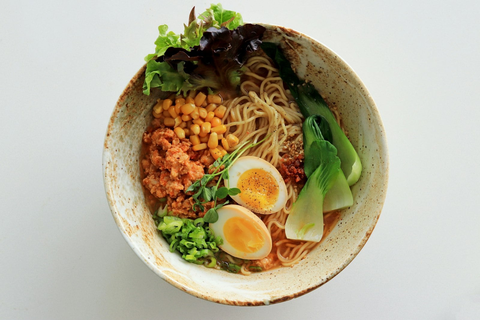 A loaded ramen bowl with ajitama