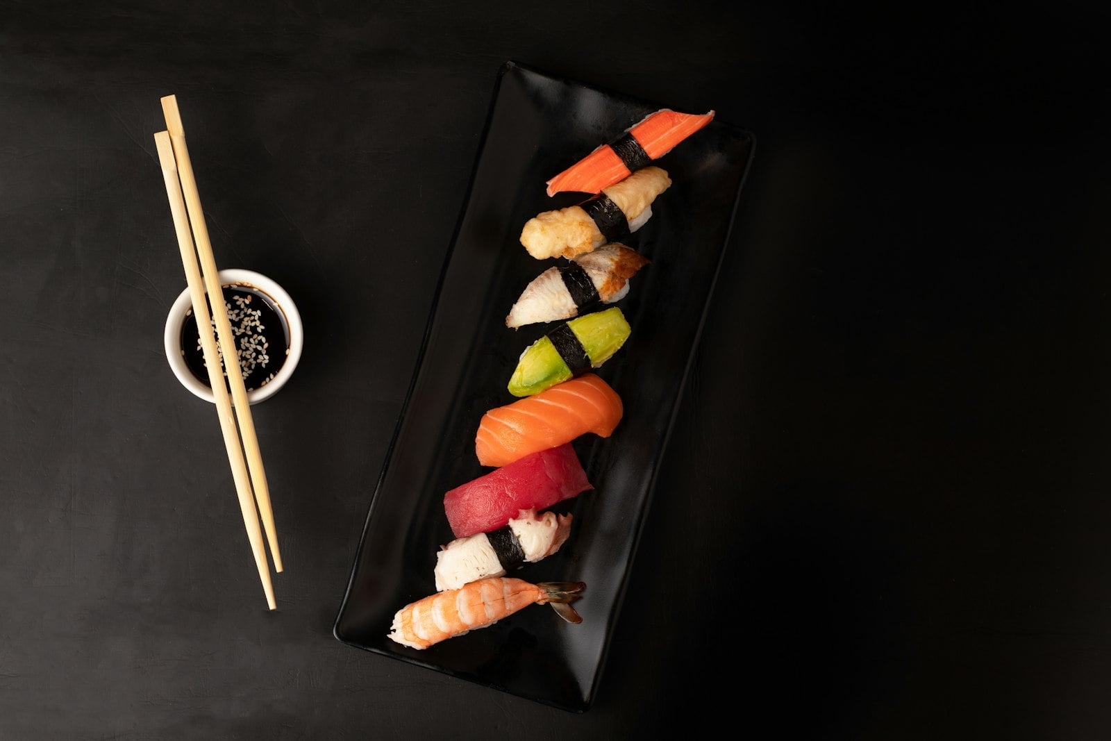 Assorted nigiri arranged at a San Diego sushi counter