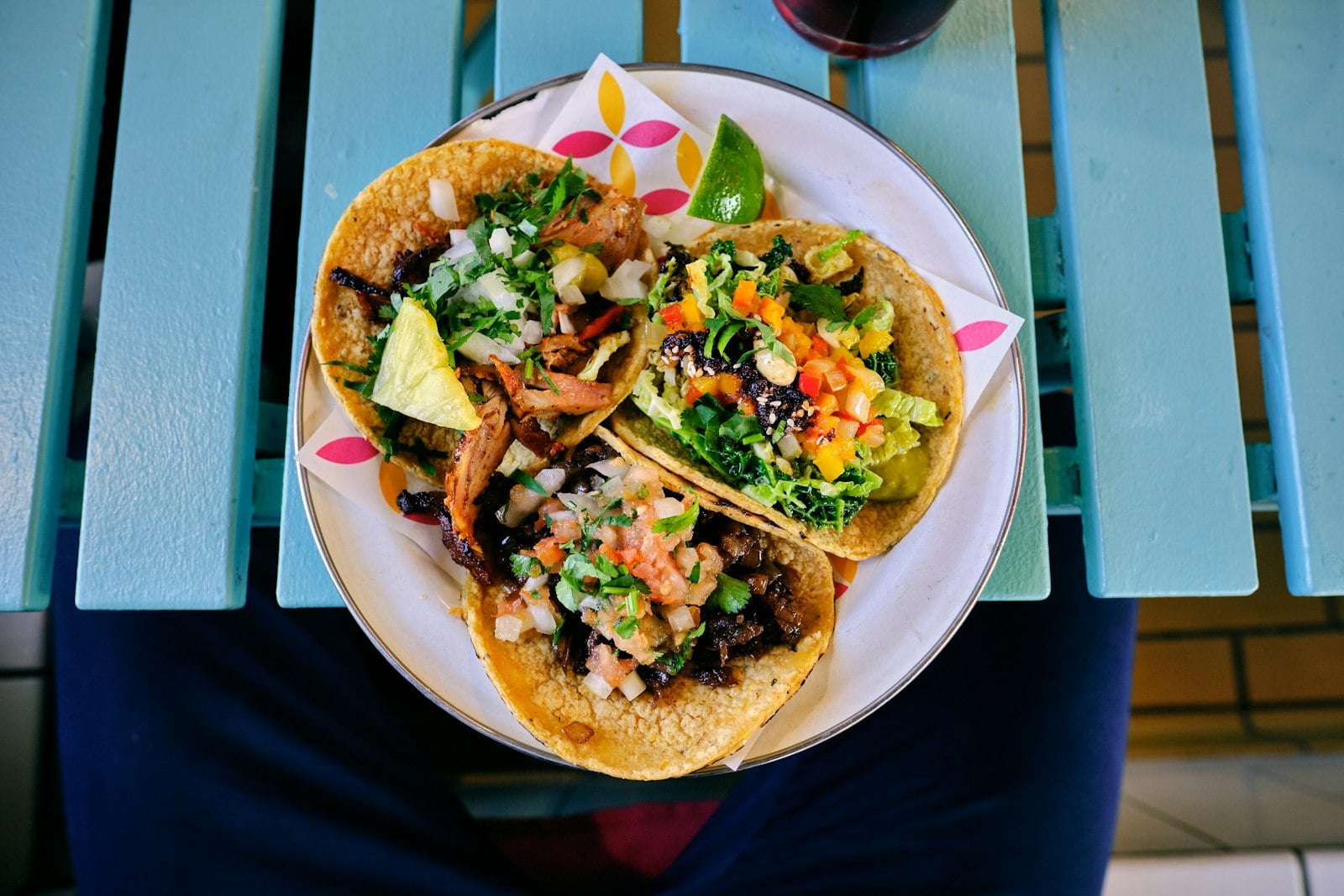 Tacos on the patio table, overhead
